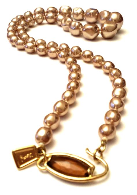 yves saint laurent star lock|ysl pearl jewelry.